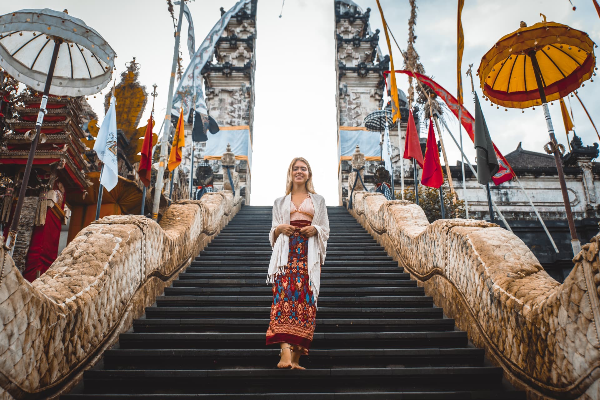 Woman on the steps of Pura Lempuyang temple in Bali
